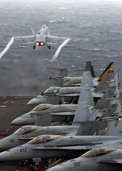 US Navy 060322-N-9079D-037 An F-A-18C Hornet assigned to Strike Fighter Squadron One Five One (VFA-151), launches off the flight deck aboard the Nimitz-class aircraft carrier USS Abraham Lincoln (CVN 72)