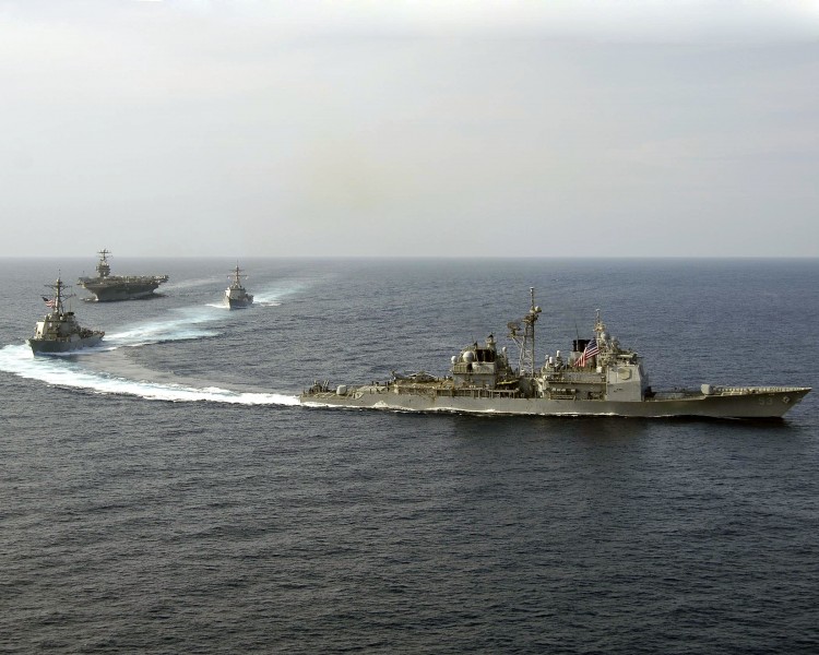 US Navy 060416-N-5837R-113 USS Mobile Bay (CG 53), USS Russell (DDG 59), and USS Shoup (DDG 86) perform a pass and review with the Nimitz-class aircraft carrier USS Abraham Lincoln (CVN 72)