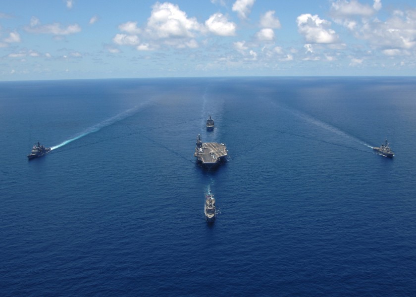 US Navy 060429-N-9621S-014 Ships assigned to the George Washington Carrier Strike group sail in formation during a strike group photo exercise