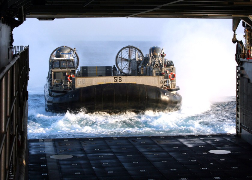 US Navy 070209-N-6710M-001 A Landing Craft Air Cushion (LCAC) prepares to enter the well deck of dock landing ship USS Tortuga (LSD 46) after an offload of Marine equipment in the vicinity of Okinawa, Japan