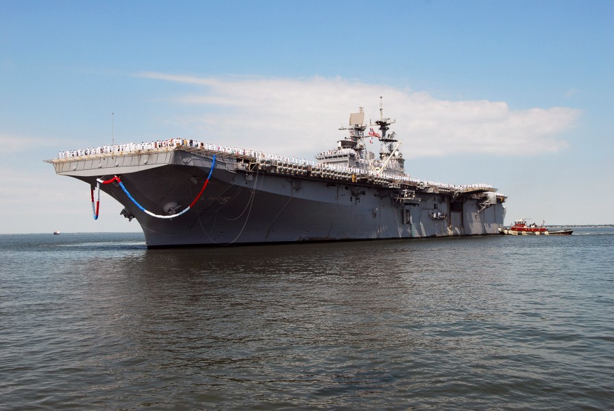 US Navy 070703-N-1023B-055 Amphibious assault ship USS Bataan (LHD 5) pulls into port at Naval Station Norfolk after a six-month deployment
