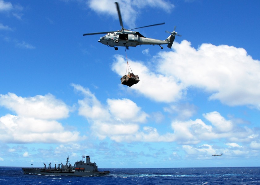 US Navy 080929-N-2183K-040 An MH-60S Sea Hawk carries a cargo pendant