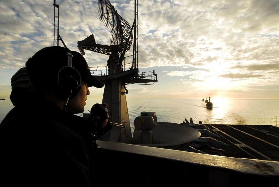 US Navy 090120-N-6538W-116 Seaman Sean Flaherty, from Philadelphia, stands aft port lookout watch aboard the aircraft carrier USS John C. Stennis (CVN 74)