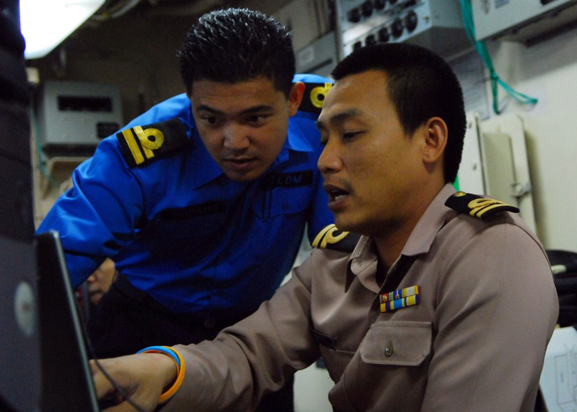 US Navy 090817-N-5207L-080 Naval liaison officers from Malaysia and Thailand coordinate efforts aboard the amphibious dock landing ship USS Harpers Ferry (LSD 49)