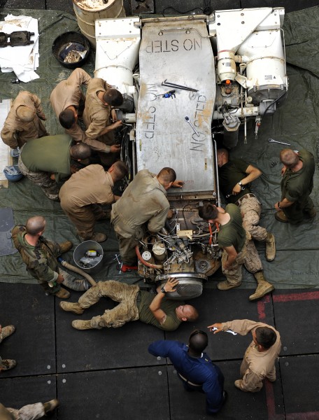 US Navy 091015-N-5345W-152 Marines assigned to Combat Logistics Battalion (CLB) 22 of the 22nd Marine Expeditionary Unit (22nd MEU) replace the engine of an M1A1 Abrams main battle tank