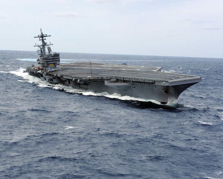 US Navy 100227-N-1854W-716 USS George H.W. Bush (CVN 77) heels hard to starboard during high-speed drills