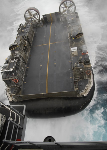 US Navy 100708-N-8283S-038 A landing craft air cushion enters the well deck of USS Boxer (LHD 4)