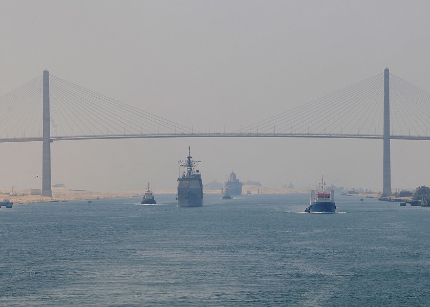US Navy 100718-N-1082Z-073 The guided-missile cruiser USS San Jacinto (CG 56) and the amphibious transport dock ship USS Mesa Verde (LPD 19) pass under the Egyptian-Japanese Friendship Bridge