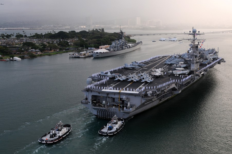 US Navy 110310-N-PM781-330 The aircraft carrier USS Abraham Lincoln (CVN 72) enters Pearl Harbor for a port visit