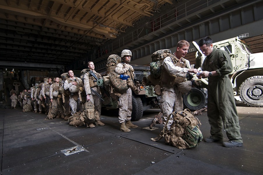 US Navy 110423-N-RC734-312 Marines assigned to the 13th Marine Expeditionary Unit (MEU) prepare to board a landing craft air cushion
