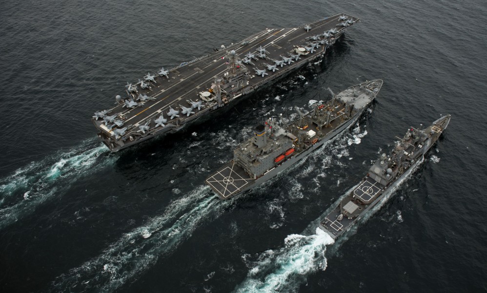 US Navy 110926-N-TU221-619 USS Abraham Lincoln (CVN 72), left, USNS Guadalupe (T-AO 200) and USS Cape St. George (CG 71) conduct a replenishment at