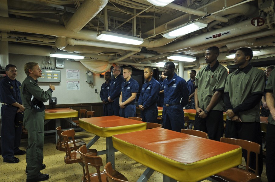 US Navy 111122-N-YM590-034 Rear Adm. Nora W. Tyson, commander of Carrier Strike Group (CSG) 2, left, speaks with Sailors during a visit aboard the 