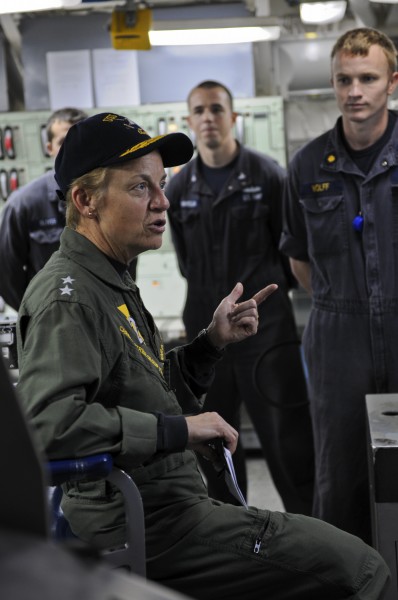 US Navy 111122-N-YM590-075 Rear Adm. Nora W. Tyson, commander of Carrier Strike Group (CSG) 2, left, speaks with Sailors in the central control sta