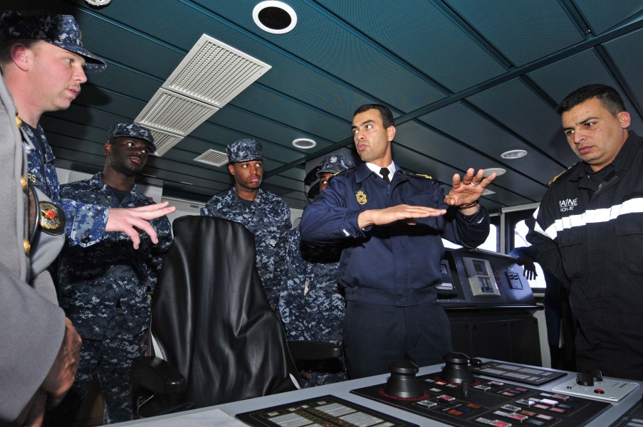 US Navy 120202-N-IZ292-146 Sailors from the guided-missile frigate USS Simpson (FFG 56) receive a brief from Royal Moroccan Navy Ensign Nabil Elkor
