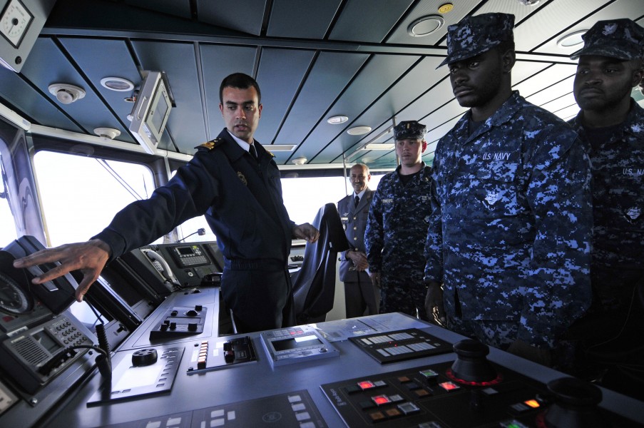US Navy 120202-N-IZ292-154 Royal Moroccan Naval Ensign Nabil Elkorchi gives a briefing to Sailors from the guided-missile frigate USS Simpson (FFG 