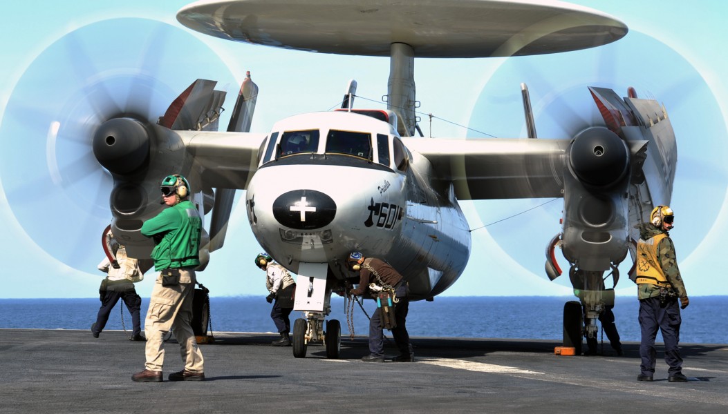 US Navy 120207-N-YB753-050 Sailors tie an aircraft to the flight deck