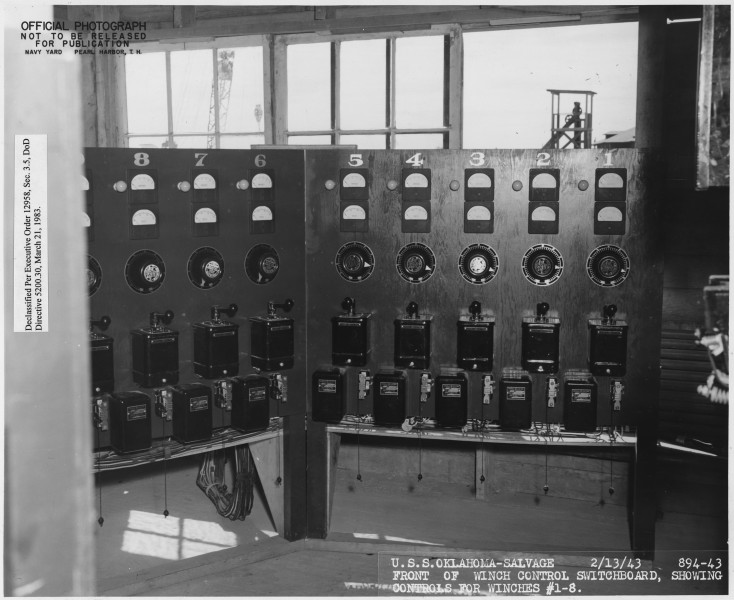 USS Oklahoma- Salvage, 2-13-43, 894-43, Front of winch control switchboard, showing controls for winches 1-8 - NARA - 296966
