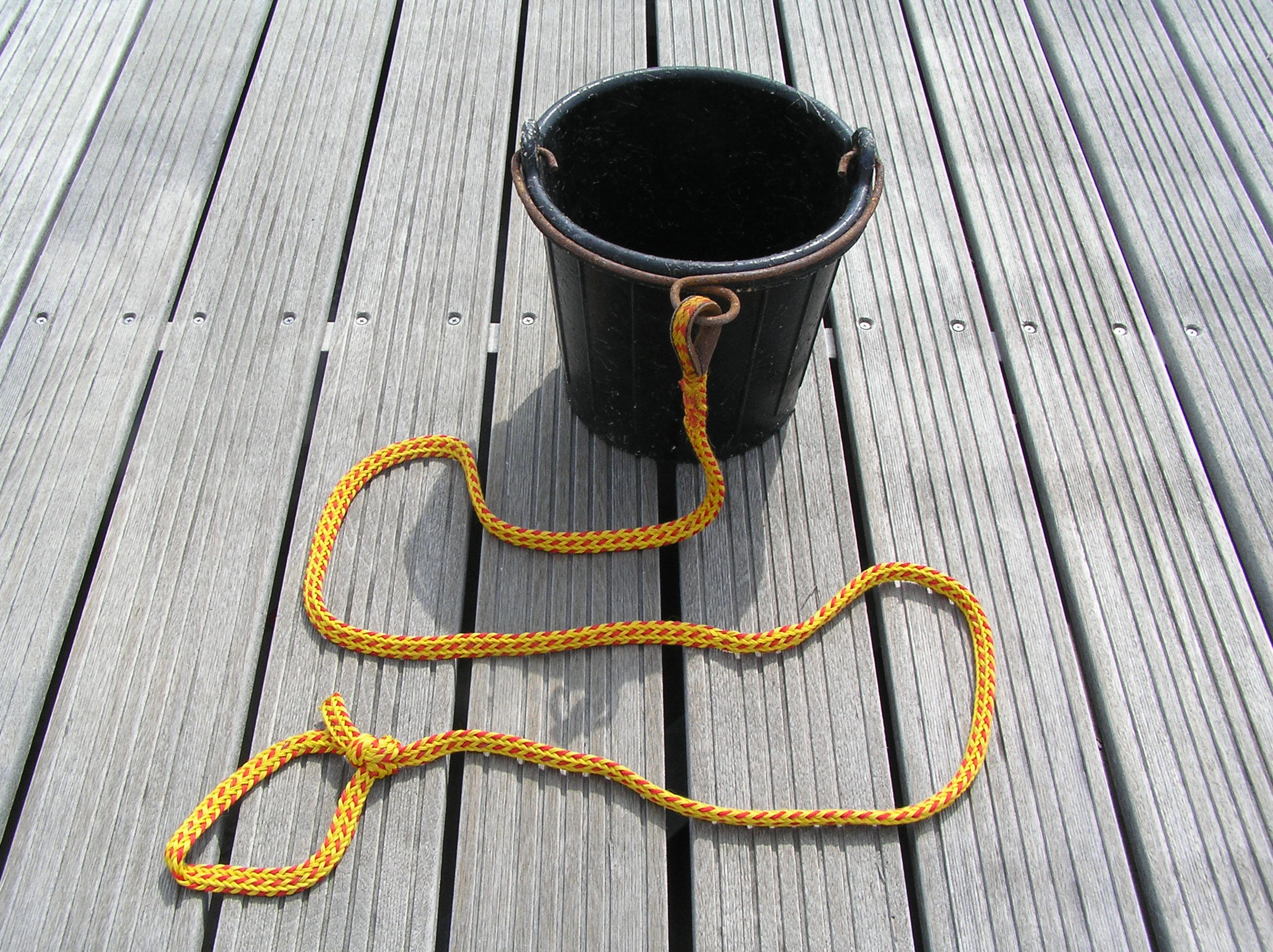 Puetz A bucket with a rope