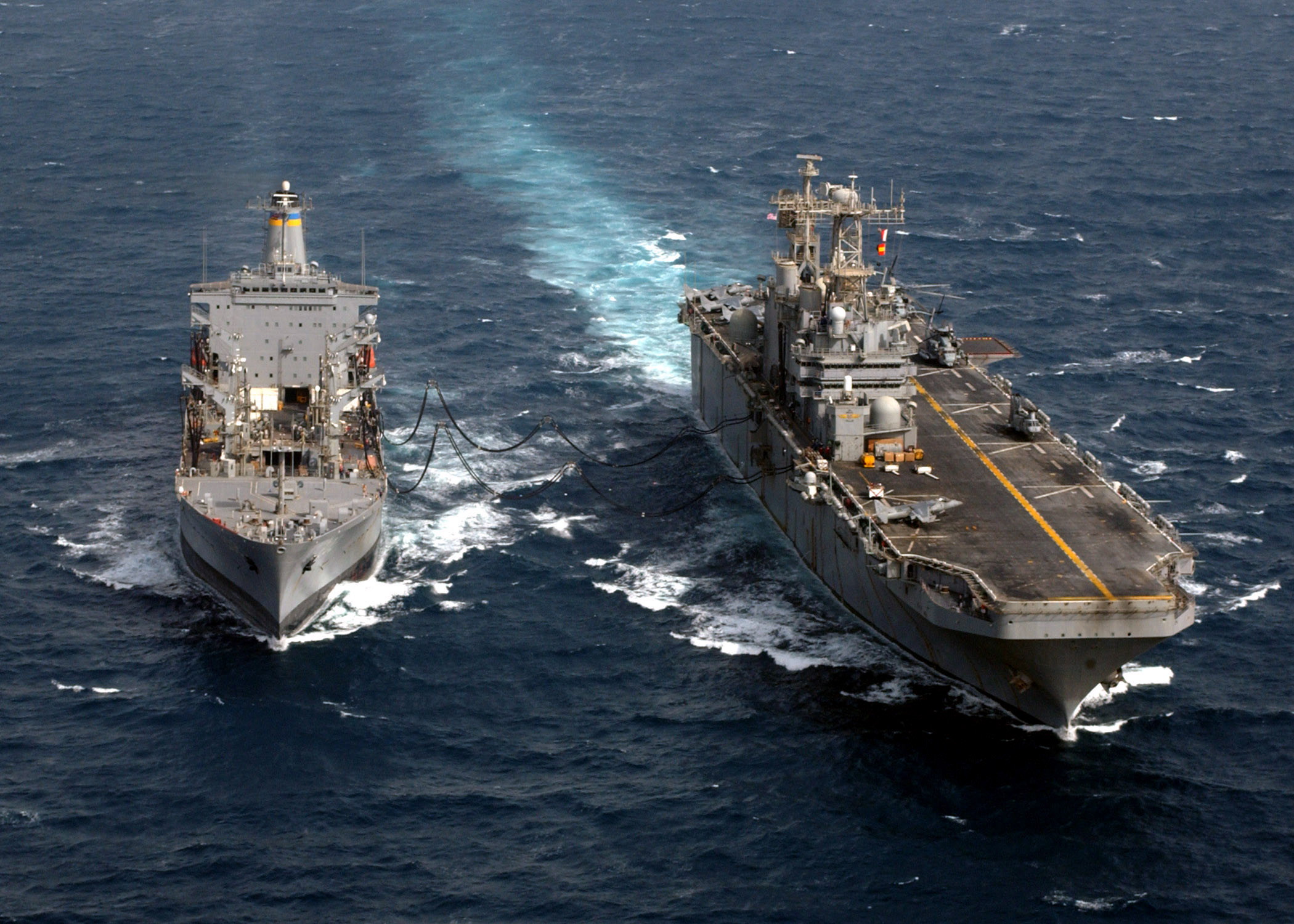 US Navy 030407-N-2515C-005 USS Tarawa (LHA 1) receives fuel during an underway replenishment (UNREP) with Military Sealift Command Oiler USNS Yukon (T-AO 202)