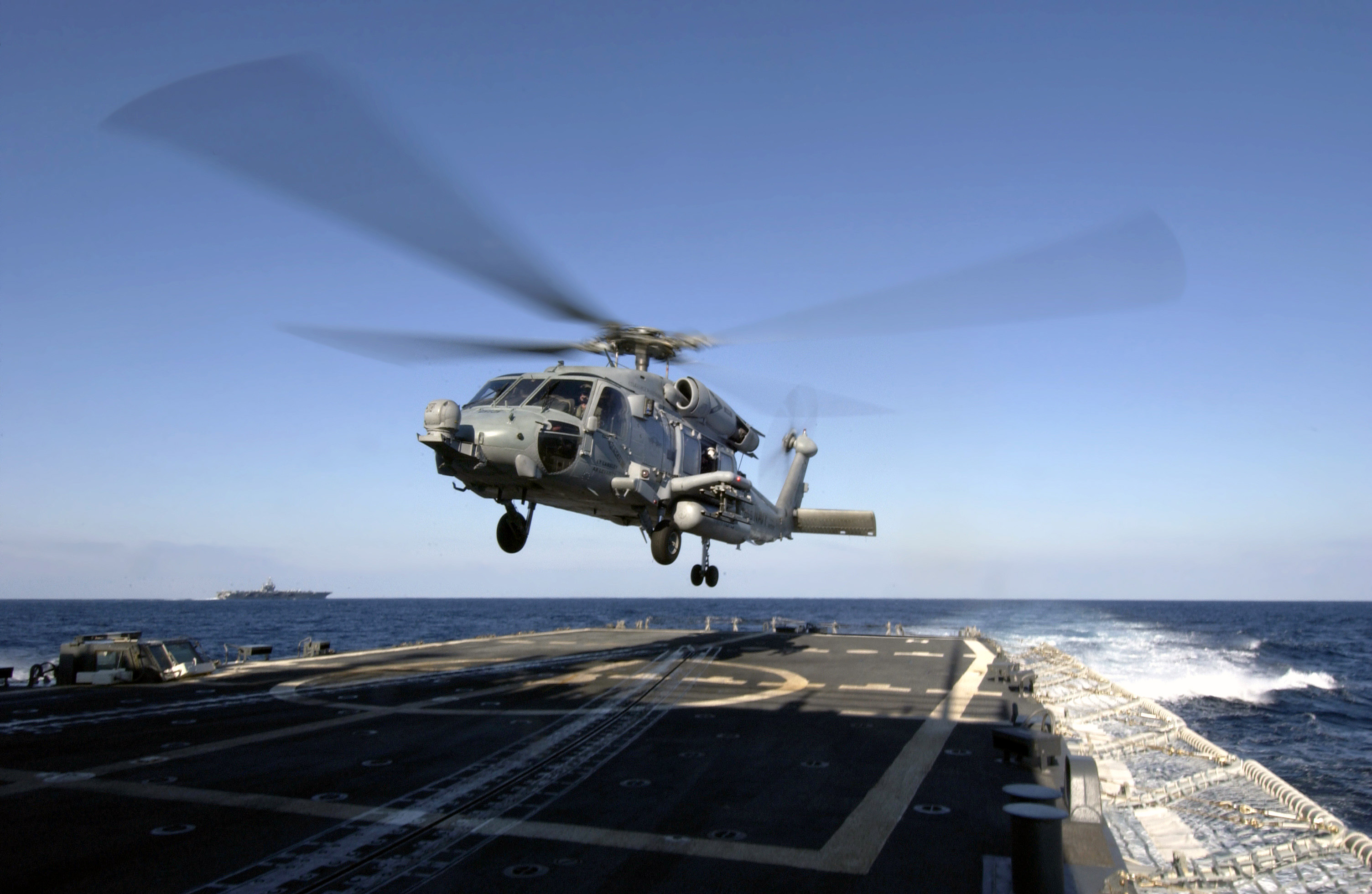 US Navy 031209-N-5319A-003 A HH-60H Seahawk helicopter assigned to ^ldquo,Nightdippers^rdquo, of Helicopter Anti-Submarine Squadron Five (HS-5) prepares to land on the flight deck