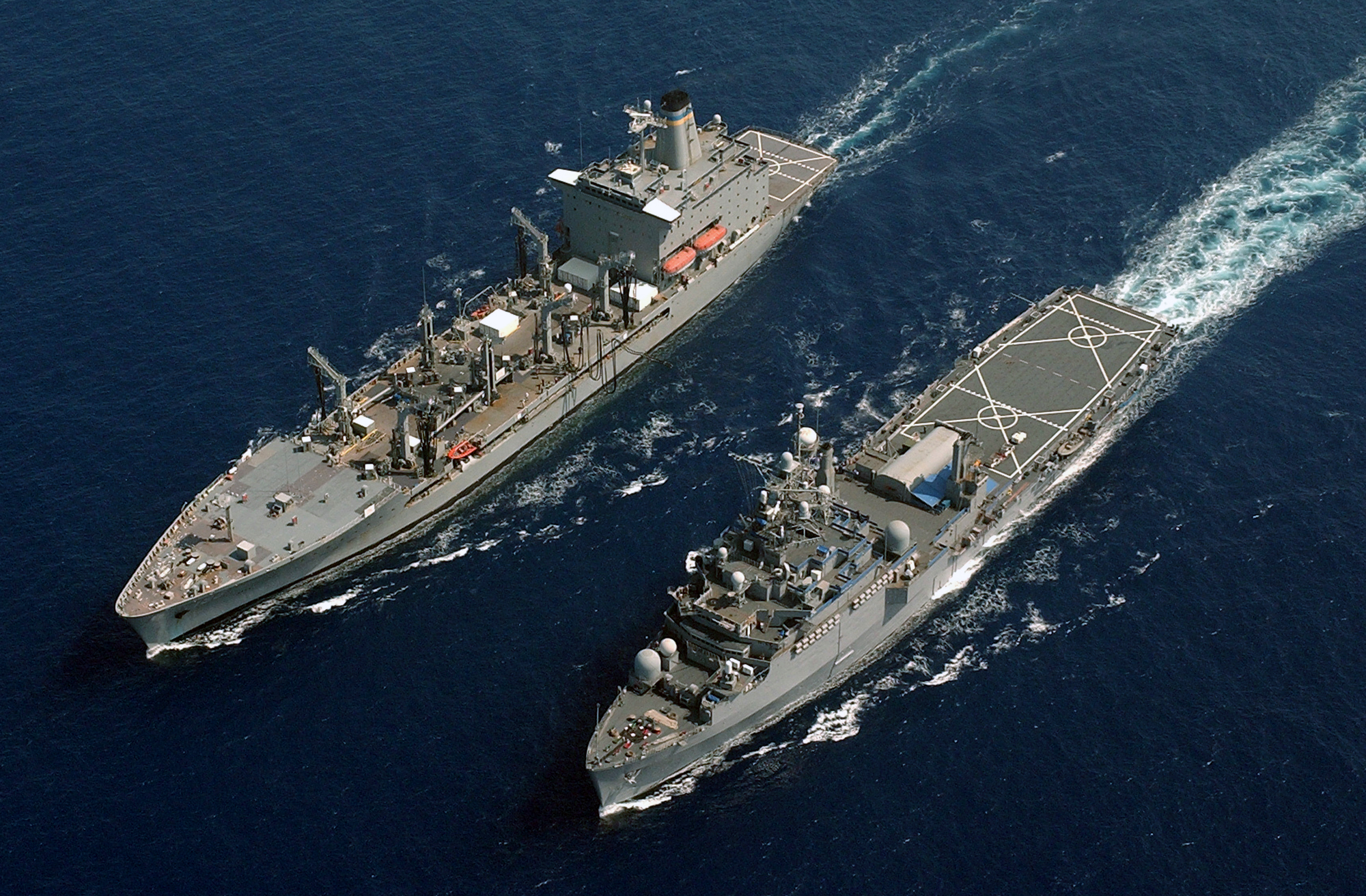 US Navy 040420-N-9849W-251 The command ship USS Coronado (AGF 11) pulls alongside the Military Sealift Command Ship (MSC) underway replenishment oiler USNS Tippecanoe (T-AO 199)