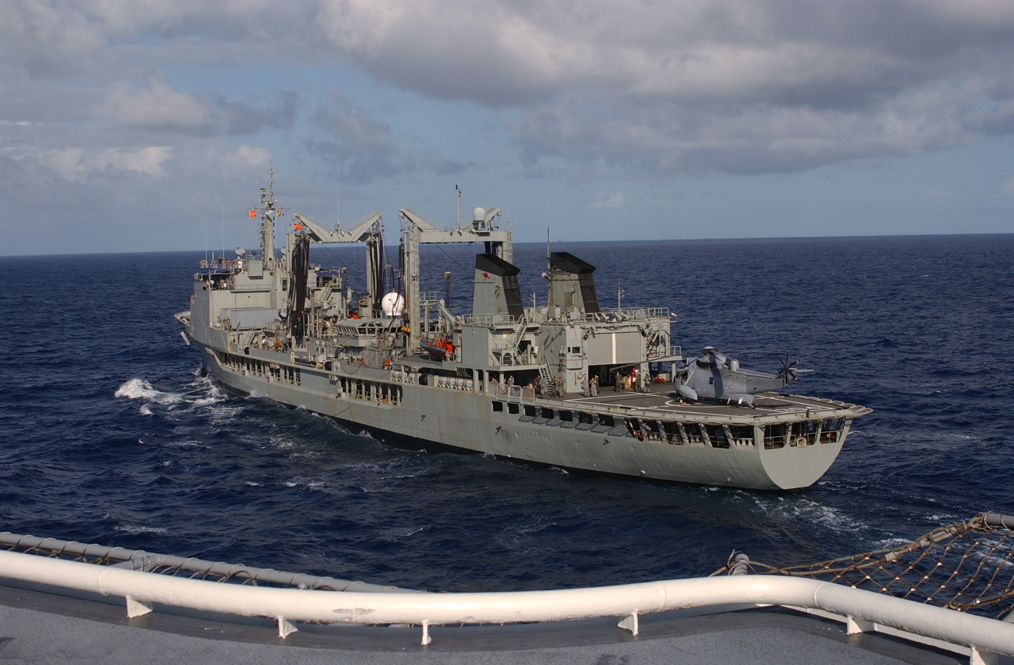 US Navy 040711-N-5055W-015 The amphibious assault ship USS Tarawa (LHA 1) pulls alongside the Australian auxiliary oiler replenishment ship HMAS Success (AOR 304)