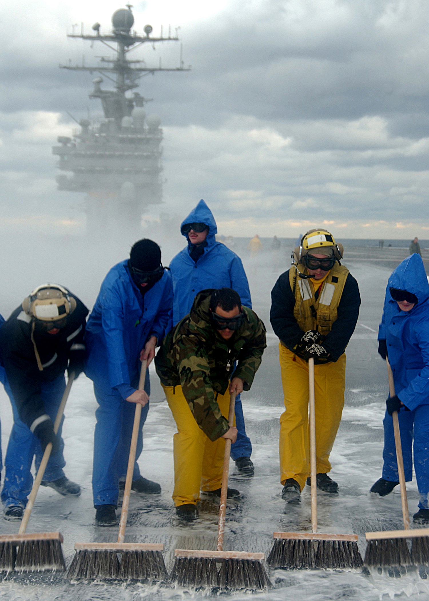 US Navy 041212-N-2838C-004 Sailors assigned to Air Department conduct a Scrub Exercise (SCRUBEX) on the flight deck aboard the Nimitz-class aircraft carrier USS Theodore Roosevelt (CVN 71)