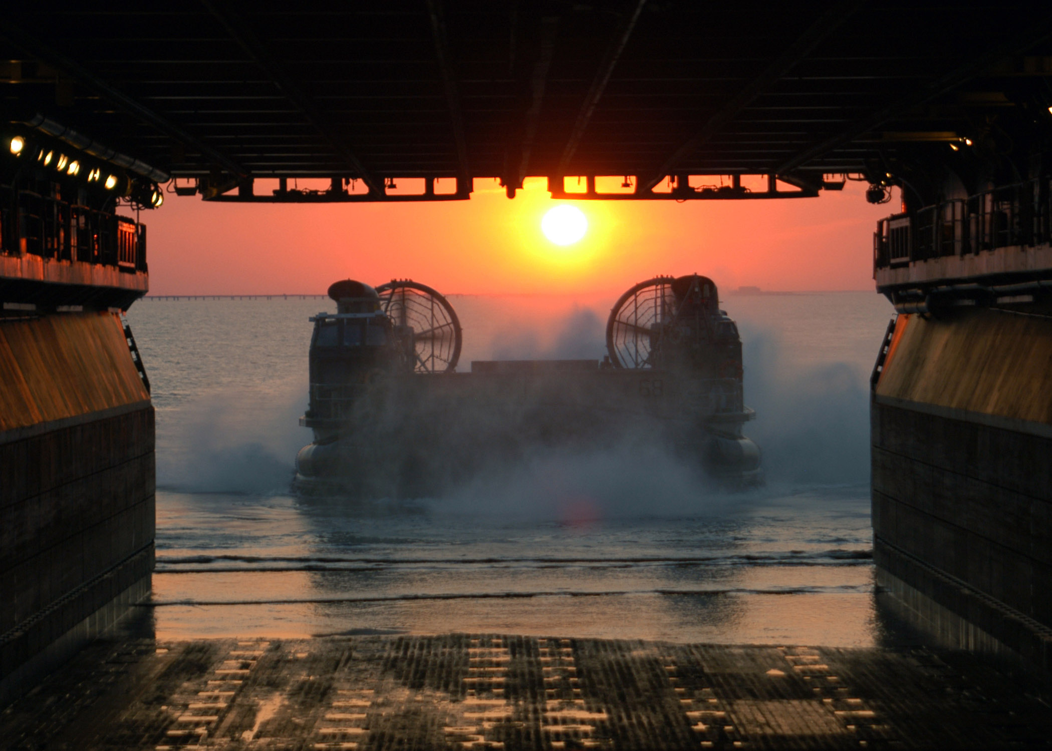 US Navy 060424-N-3557N-083 A Landing Craft Air Cushion (LCAC) prepares to enter the well deck of amphibious assault ship, USS Kearsarge (LHD 3)