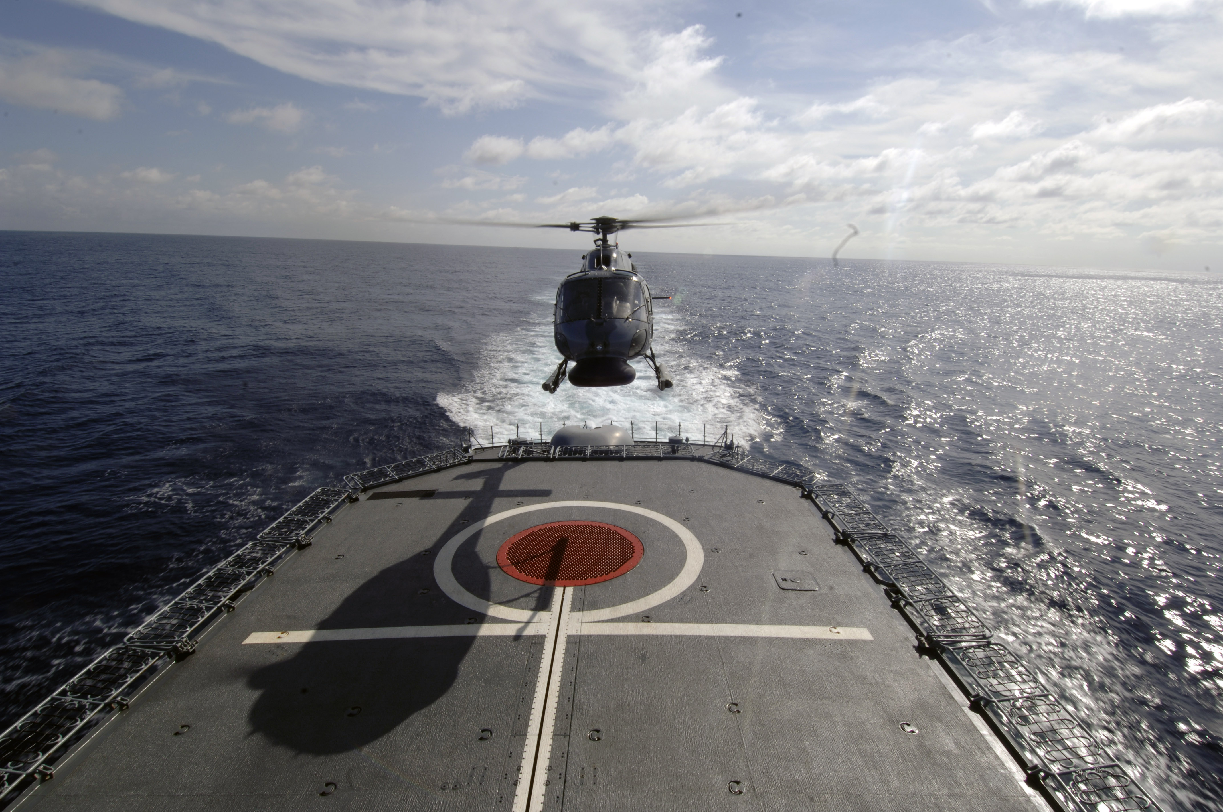US Navy 060828-N-6240R-001 A Colombian helicopter pilot lines up for landing aboard the Colombian frigate ARC (Armada Republica de Colombia) Antioquia (FL 53) during exercise PANAMAX 2006