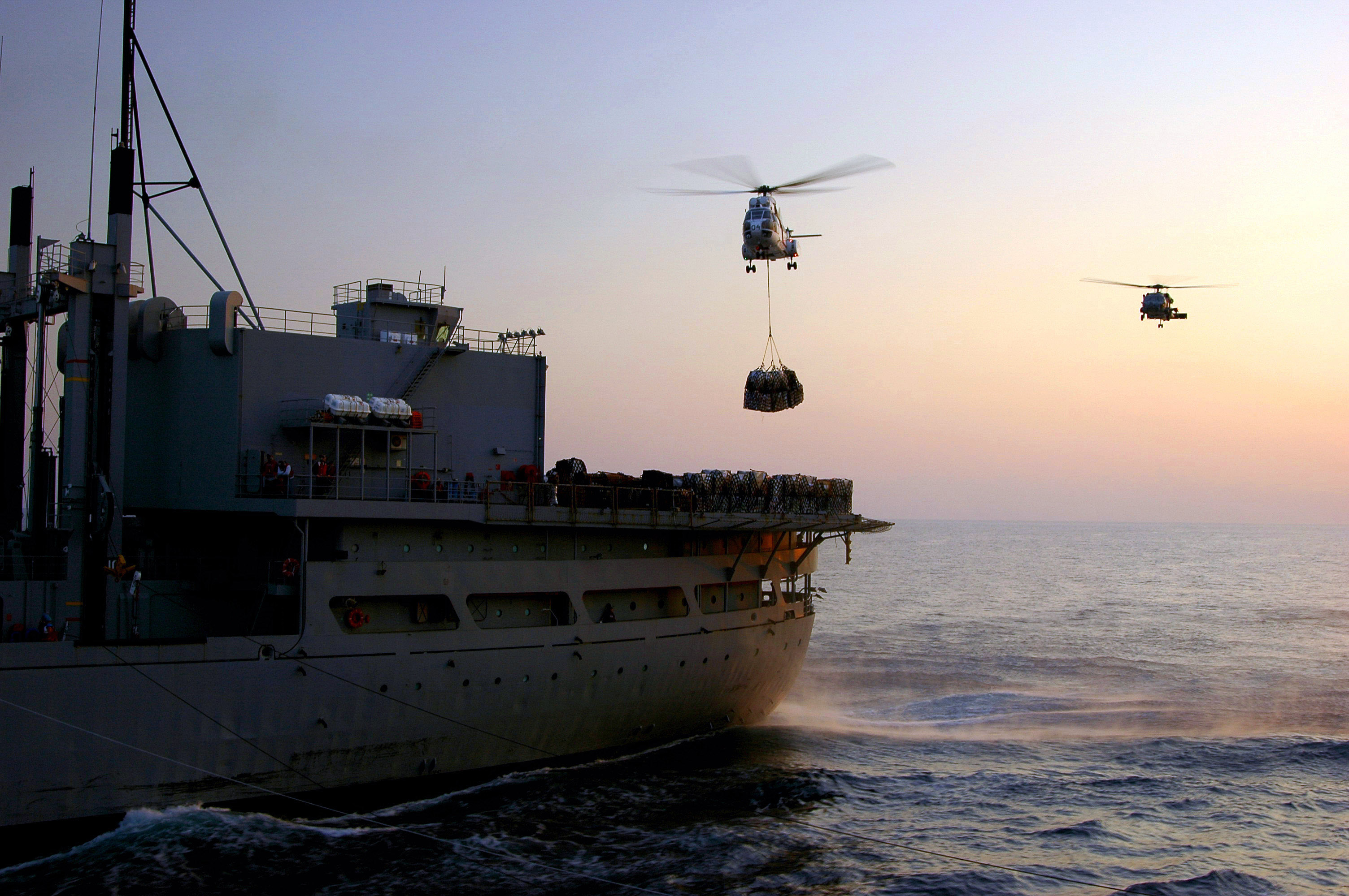 US Navy 061130-N-0490C-004 An SA-330 Puma helicopter assigned to Military Sealift Command (MSC) combat stores ship USNS Spica (T-AFS 9) moves supplies during a vertical replenishment (VERTREP)