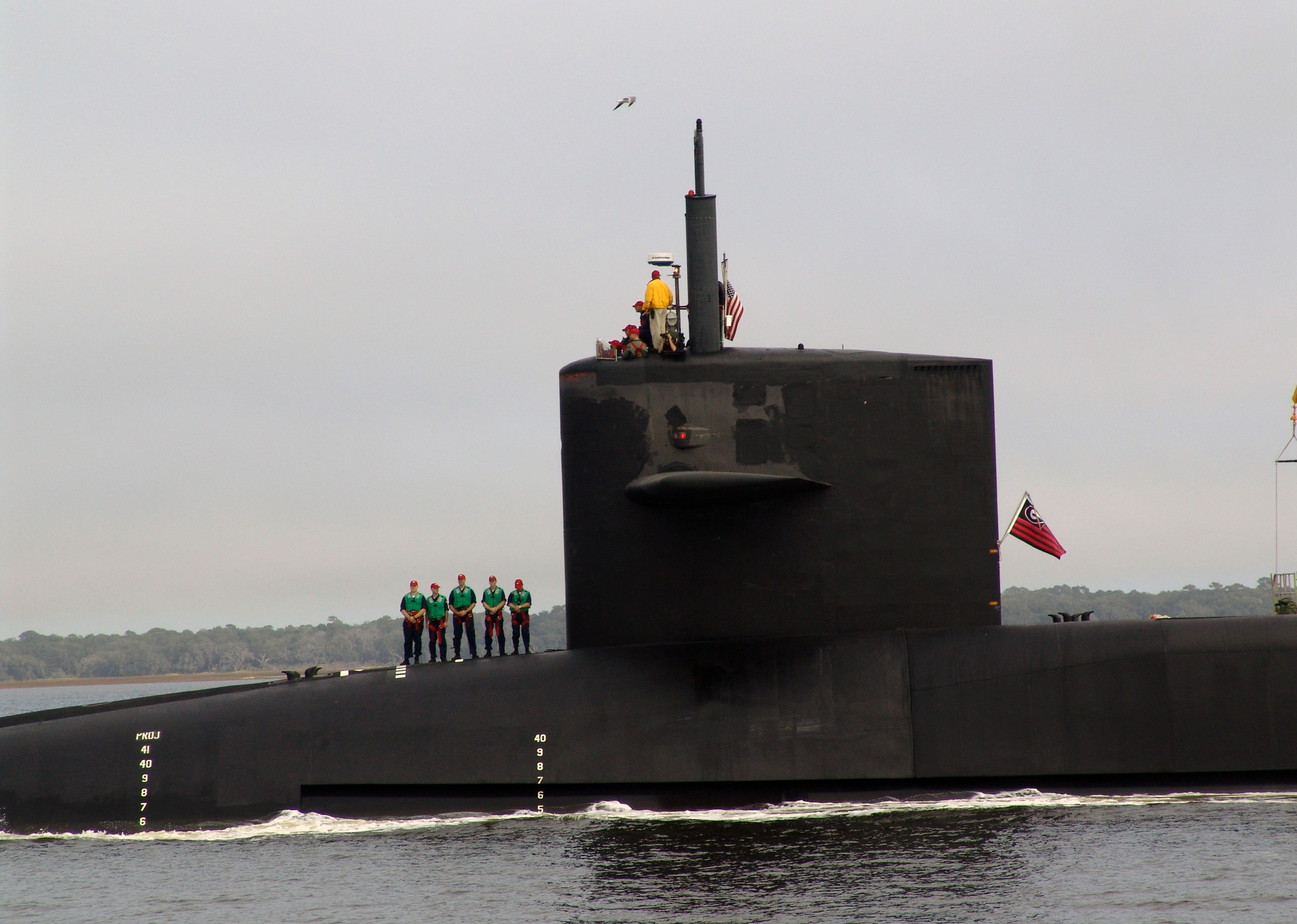 US Navy 071215-N-1841C-014 Sailors aboard the nuclear-powered guided-missile submarine USS Georgia (SSGN 729) makes her final approach through the South Georgia inland passage of the Atlantic Intracostal Waterway