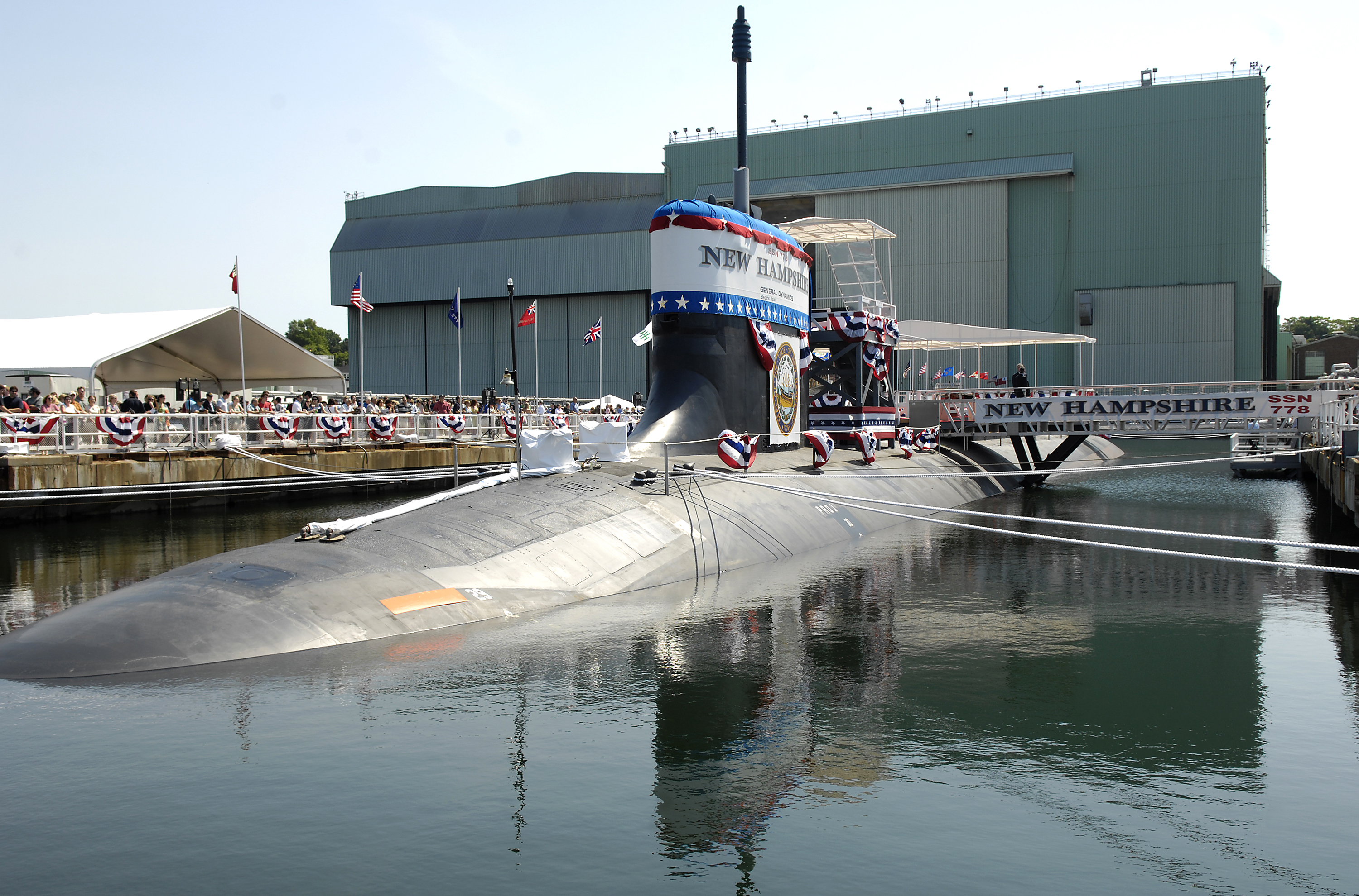US Navy 080621-N-8467N-001 Pre-commissioning Unit New Hampshire (SSN 778) sits moored to the pier at General Dynamics Electric Boat shipyard moments before her christening ceremony commenced