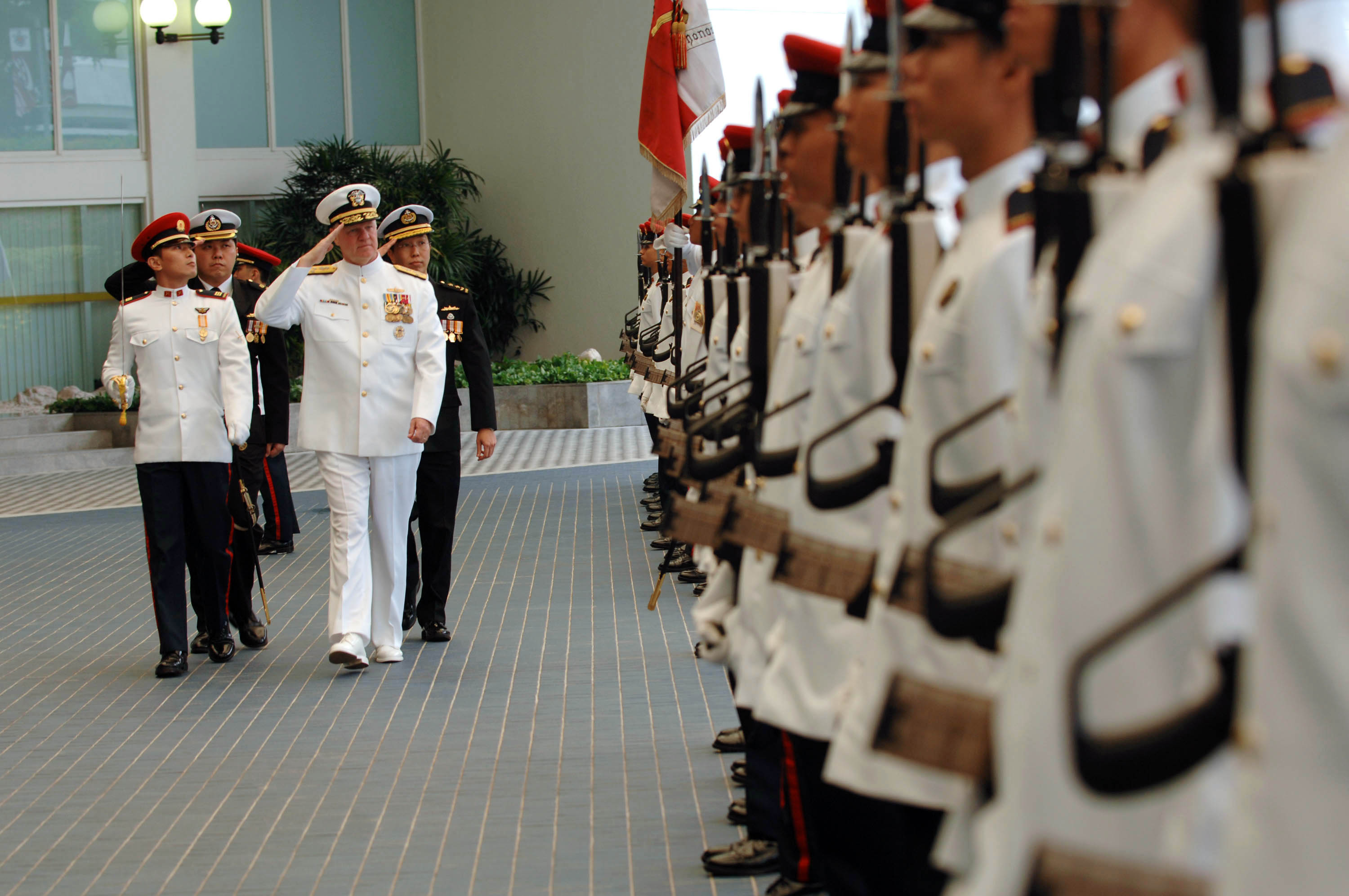 US Navy 080818-N-8273J-130 Chief of Naval Operations (CNO) Adm. Gary Roughead inspects the troops of the Republic of Singapore Navy