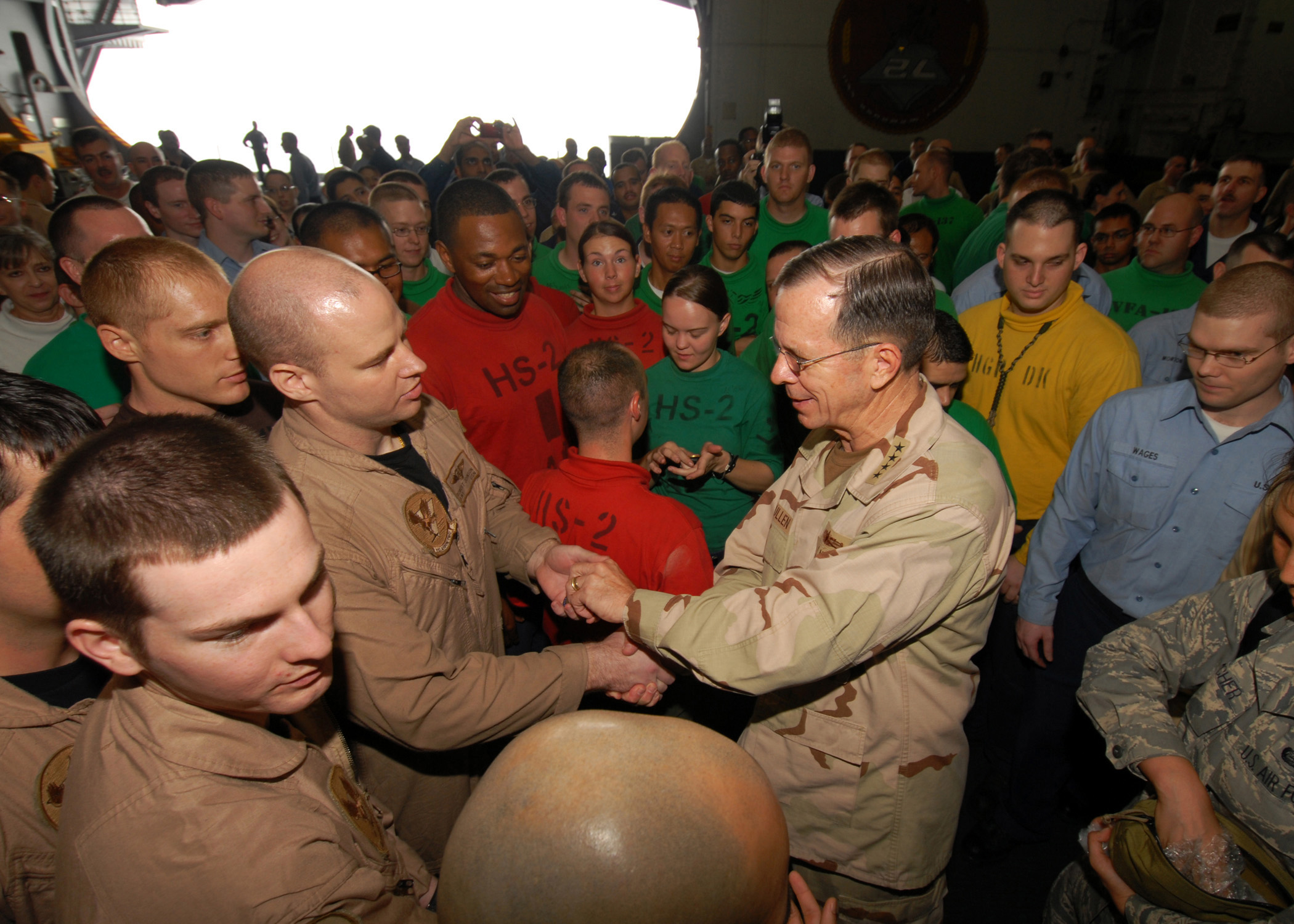 US Navy 080827-N-9079D-032 Chairman, Joint Chiefs of Staff Adm. Mike Mullen meets with Sailors in the hangar bay of the aircraft carrier USS Abraham Lincoln (CVN 72)