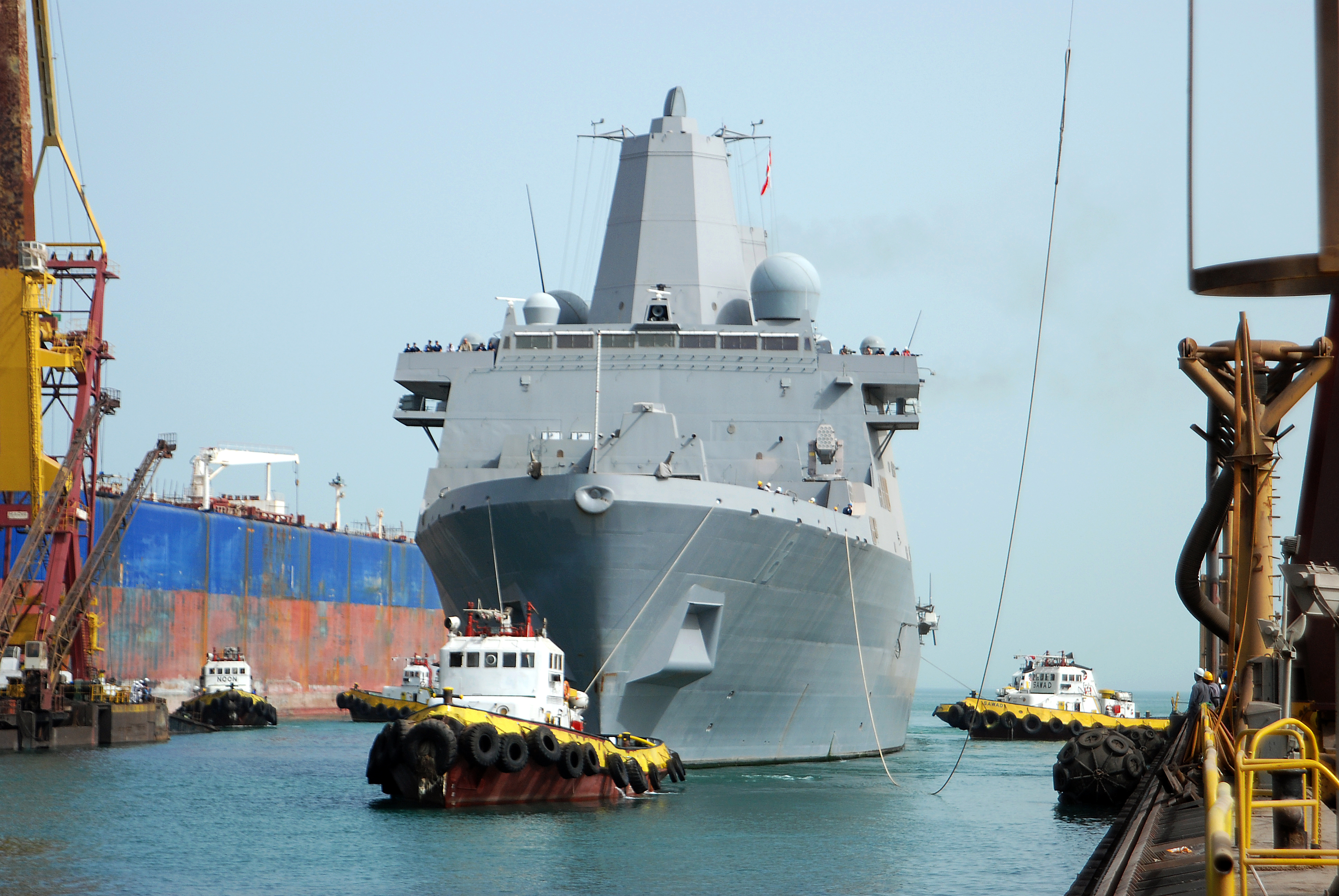 US Navy 090425-N-8053S-046 The amphibious transport dock ship USS New Orleans (LPD 18) is guided Saturday, April 25, 2009 into the Arab Shipbuilding ^ Repair Yard Company dry-dock facility