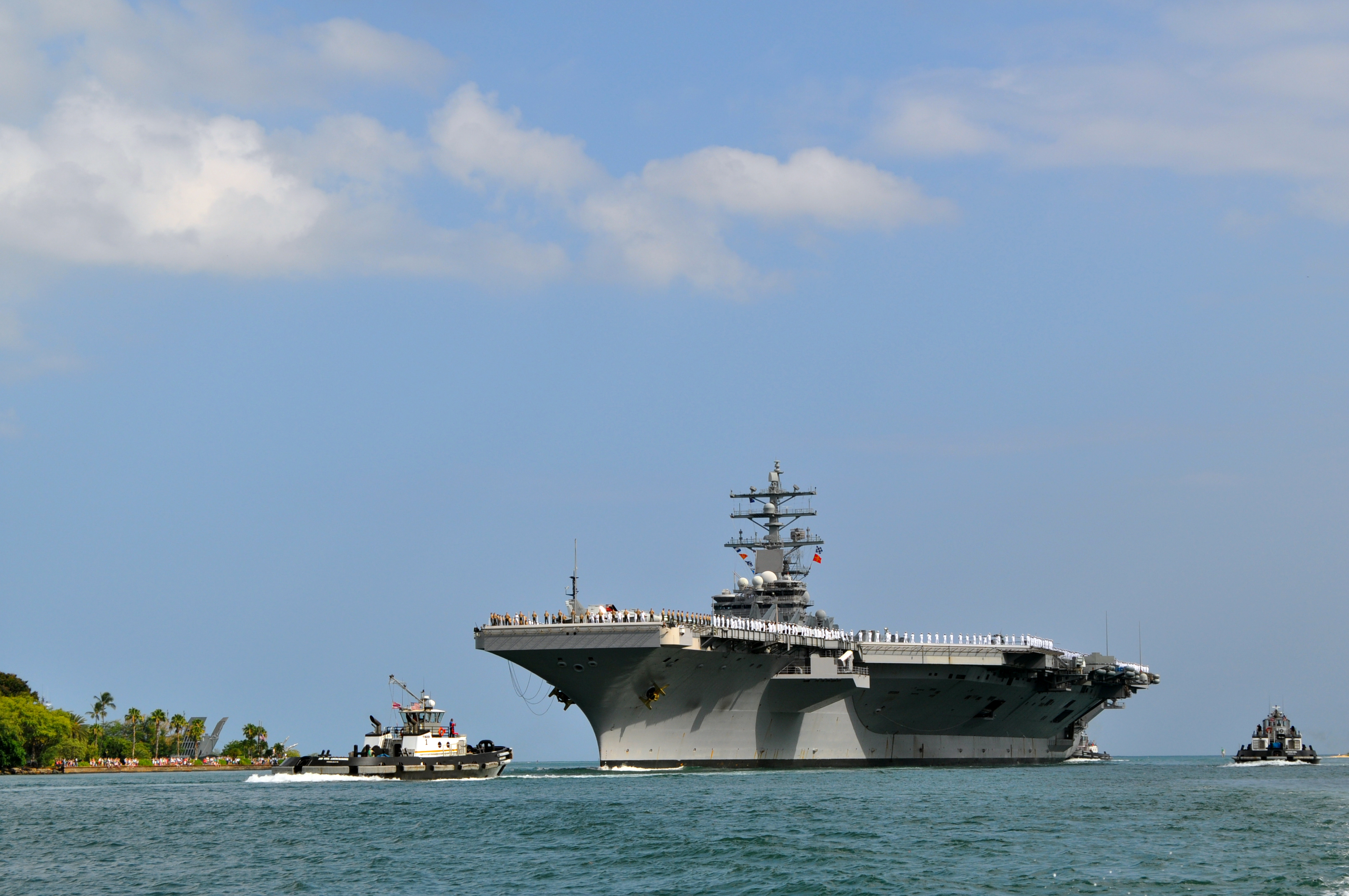 US Navy 100628-N-6999T-002 he Nimitz-class aircraft carrier USS Ronald Reagan (CVN 76) arrives at Joint Base Pearl Harbor-Hickam to participate Rim of the Pacific (RIMPAC) 2010 exercises