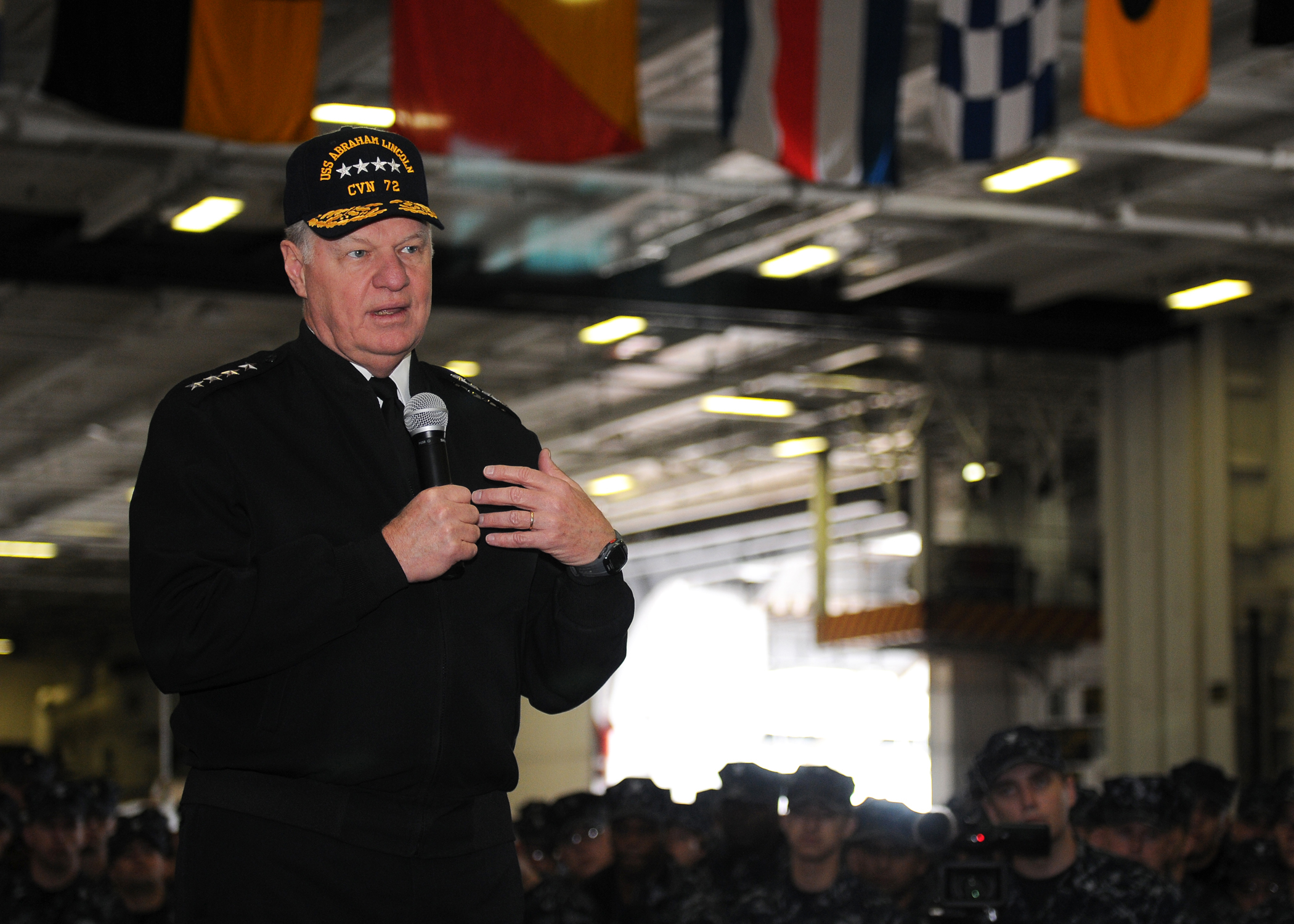 US Navy 110510-N-JN612-035 Chief of Naval Operations (CNO) Adm. Gary Roughhead speaks to Sailors during an all-hands call aboard USS Abraham Lincol