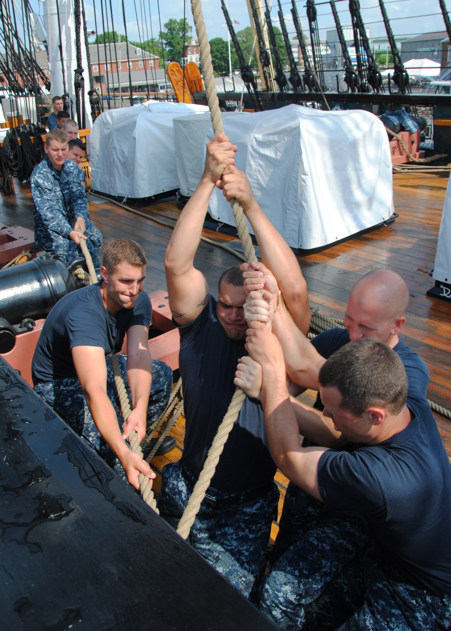 US Navy 110629-N-SH953-468 Sailors sweat the port side halyard to the main topsail yard aboard USS Constitution for the first time since the ship b