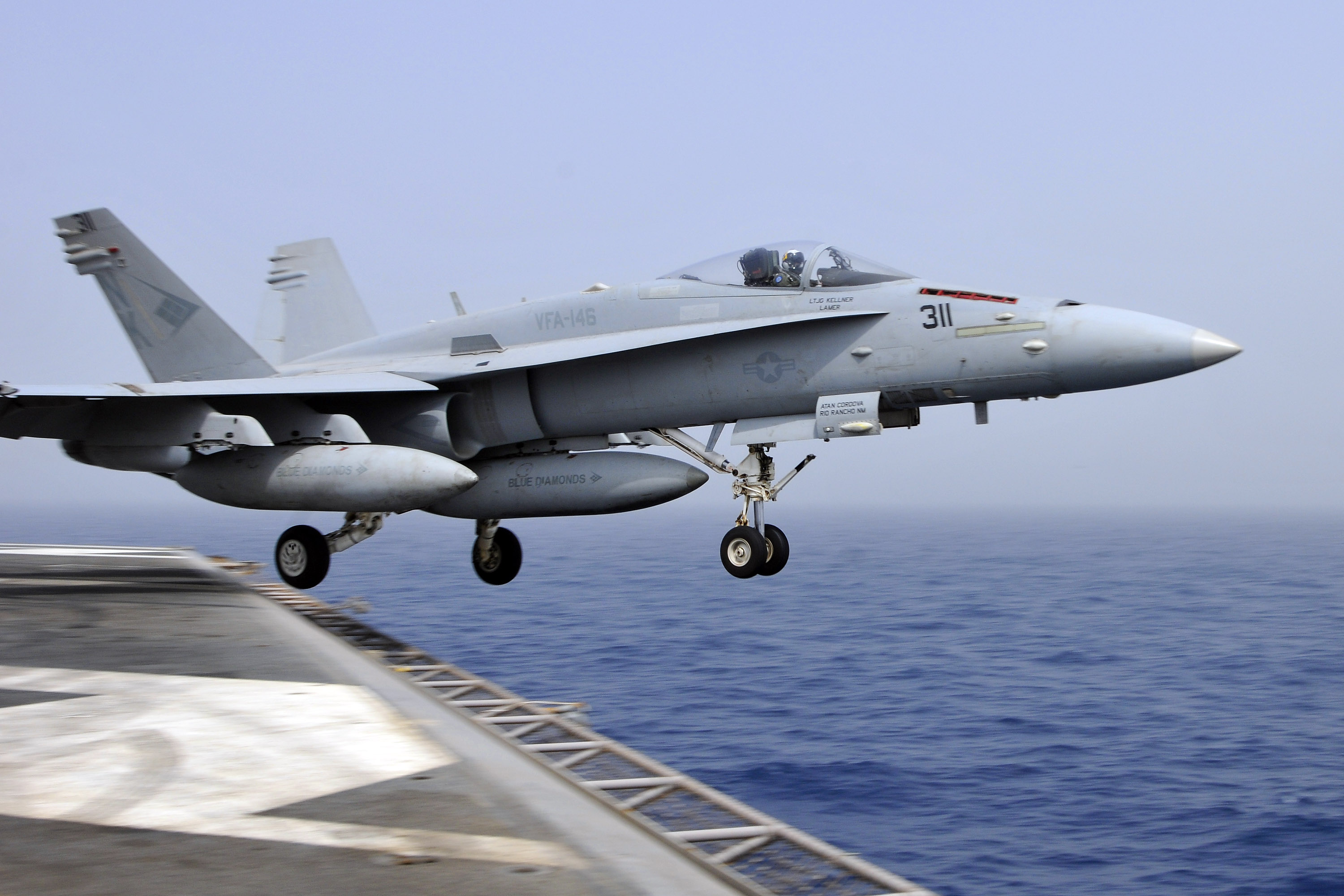 US Navy 110718-N-EE987-019 An F-A-18C Hornet assigned to the Blue Diamonds of Strike Fighter Squadron (VFA) 146 catapults from the aircraft carrier