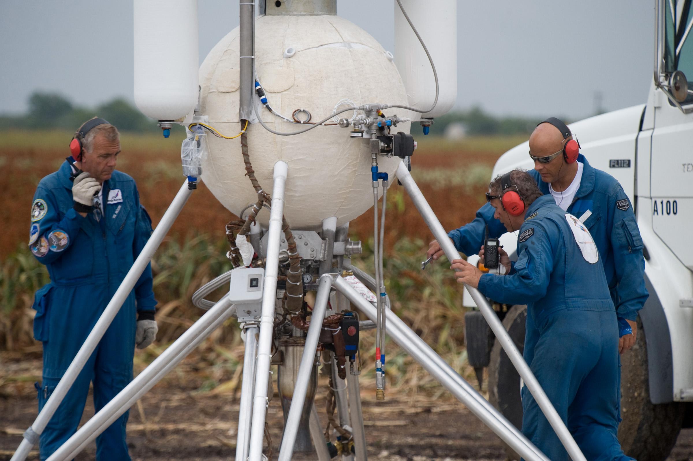 Armadillo Aerospace Technicians inspect their rocket