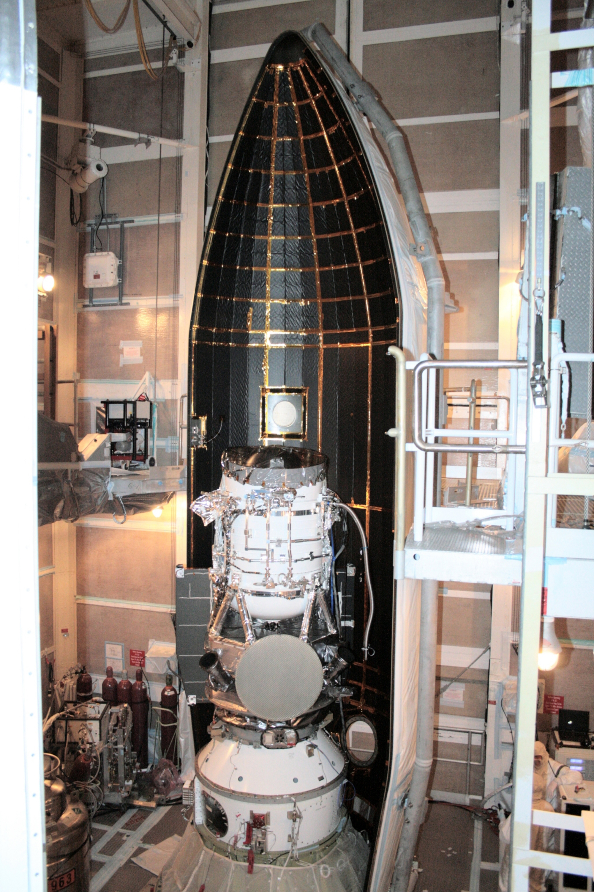 Installation of the Payload fairing around WISE