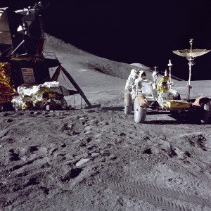 Apollo 15 Lunar Module pilot James B. Irwin loads-up the 