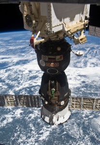 The Soyuz TMA-19 spacecraft, docked to the Rassvet Mini-Research Module 1 (MRM1), is featured in this image photographed by an Expedition 24 crew member on the International Space Station. A blue and white part of Earth and the blackness of space provide the backdrop for the scene.