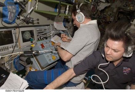 Russian Federal Space Agency cosmonauts Sergei Volkov (left) and Oleg Kononenko, Expedition 17 commander and flight engineer, respectively, make preparations in the International Space Station's Zvezda Service Module for the undocking of the European Space Agency's (ESA) 