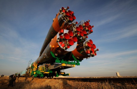 The Soyuz TMA-13 spacecraft is transported by rail car to its launch pad at the Baikonur Cosmodrome in Kazakhstan, Oct. 10, 2008 for launch Oct. 12 to carry NASA astronaut Michael Fincke, Expedition 18 commander; Russian Federal Space Agency cosmonaut Yury Lonchakov, Soyuz commander and Expedition 18 flight engineer; and American spaceflight participant Richard Garriott to the International Space Station. The three crew members will dock their Soyuz to the International Space Station on Oct. 14. Fincke and Lonchakov will spend six months on the station, while Garriott will return to Earth Oct. 24 with two of the Expedition 17 crewmembers currently on the station.