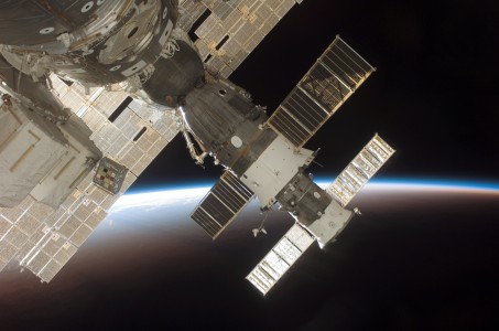 STS-116 Shuttle Mission Imagery
S116-E-06753 (17 Dec. 2006) --- The docked Soyuz 13 (TMA-9) (foreground) and Progress 22 resupply vehicle are featured in this image photographed by a STS-116 crewmember from a window on the International Space Station while Space Shuttle Discovery was docked with the station. The blackness of space and Earth's horizon provide the backdrop for the scene.