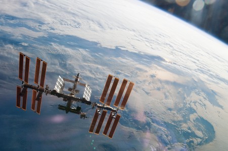 Backdropped by Earth's horizon and the blackness of space, the International Space Station is featured in this image photographed by an STS-130 crew member on space shuttle Endeavour after the station and shuttle began their post-undocking relative separation. Undocking of the two spacecraft occurred at 7:54 p.m. (EST) on Feb. 19, 2010.