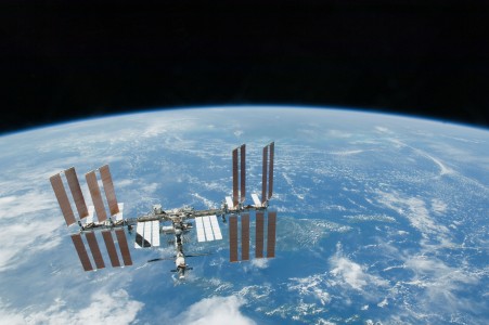 Backdropped by Earth's horizon and the blackness of space, the International Space Station is featured in this image photographed by an STS-130 crew member on space shuttle Endeavour after the station and shuttle began their post-undocking relative separation. Undocking of the two spacecraft occurred at 7:54 p.m. (EST) on Feb. 19, 2010.