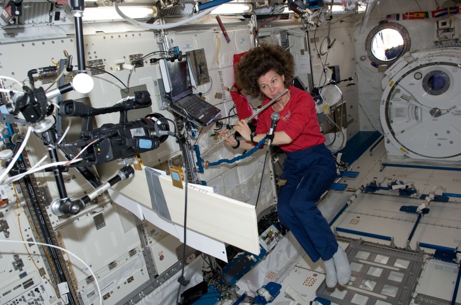ISS27 Catherine Coleman plays a flute