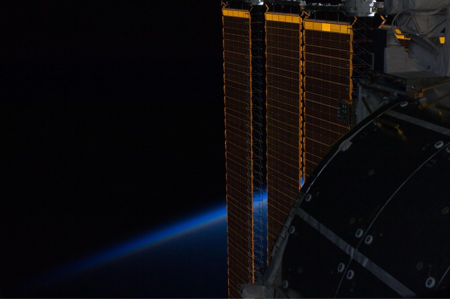 ISS solar panel intersecting Earth's horizon